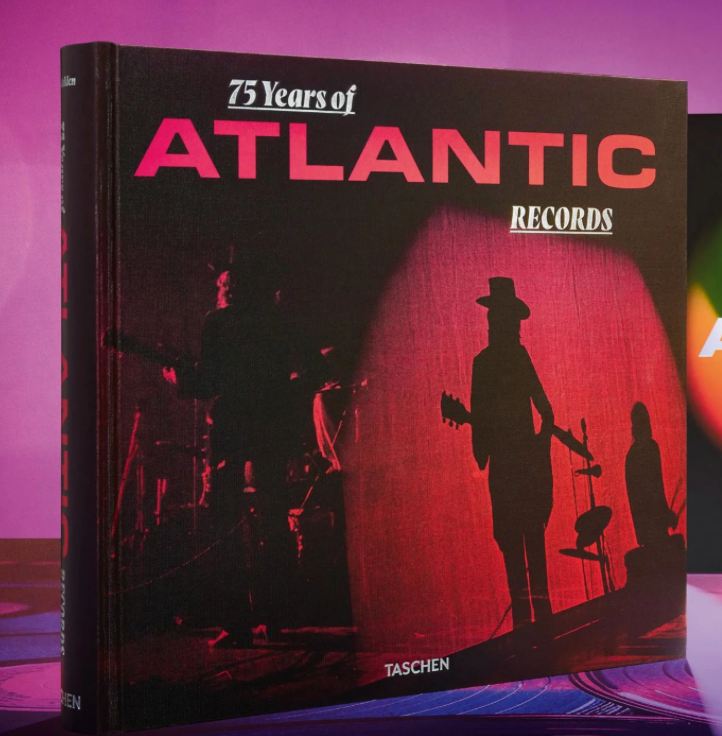 Book titled '75 Years of Atlantic Records' with silhouettes on the cover against a red background.