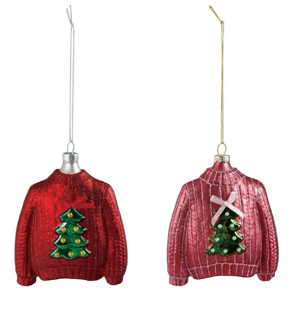 Two red sweater ornaments with Christmas tree designs on a white background