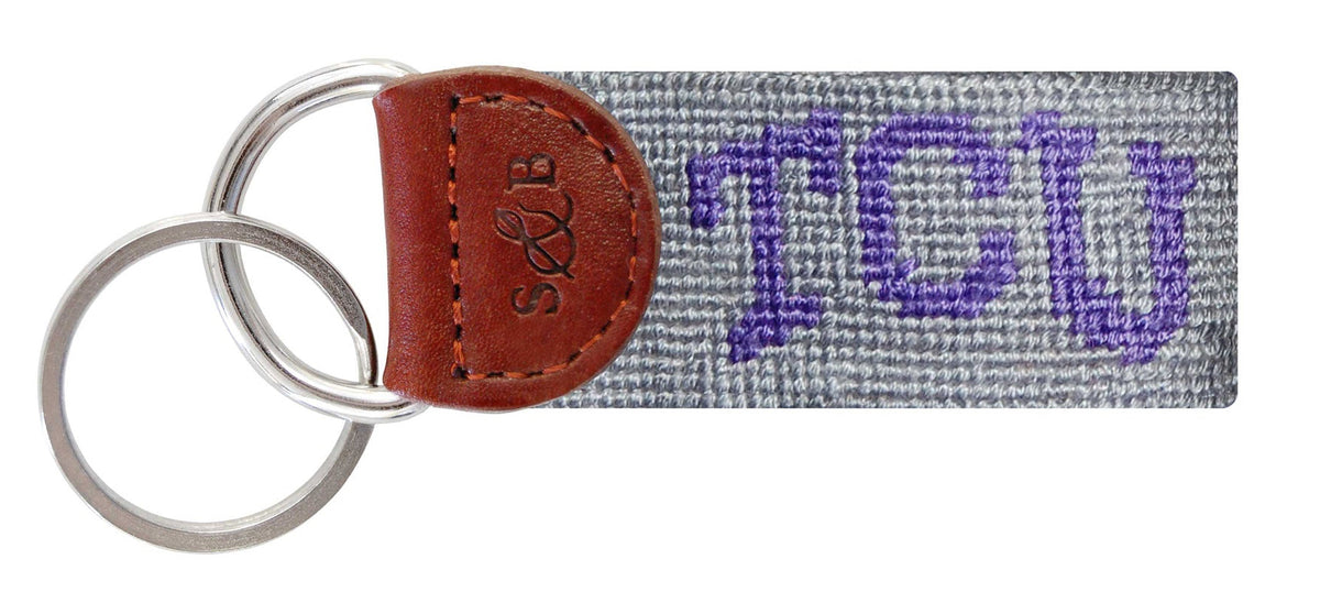 Keychain with 'TCU' on a white background