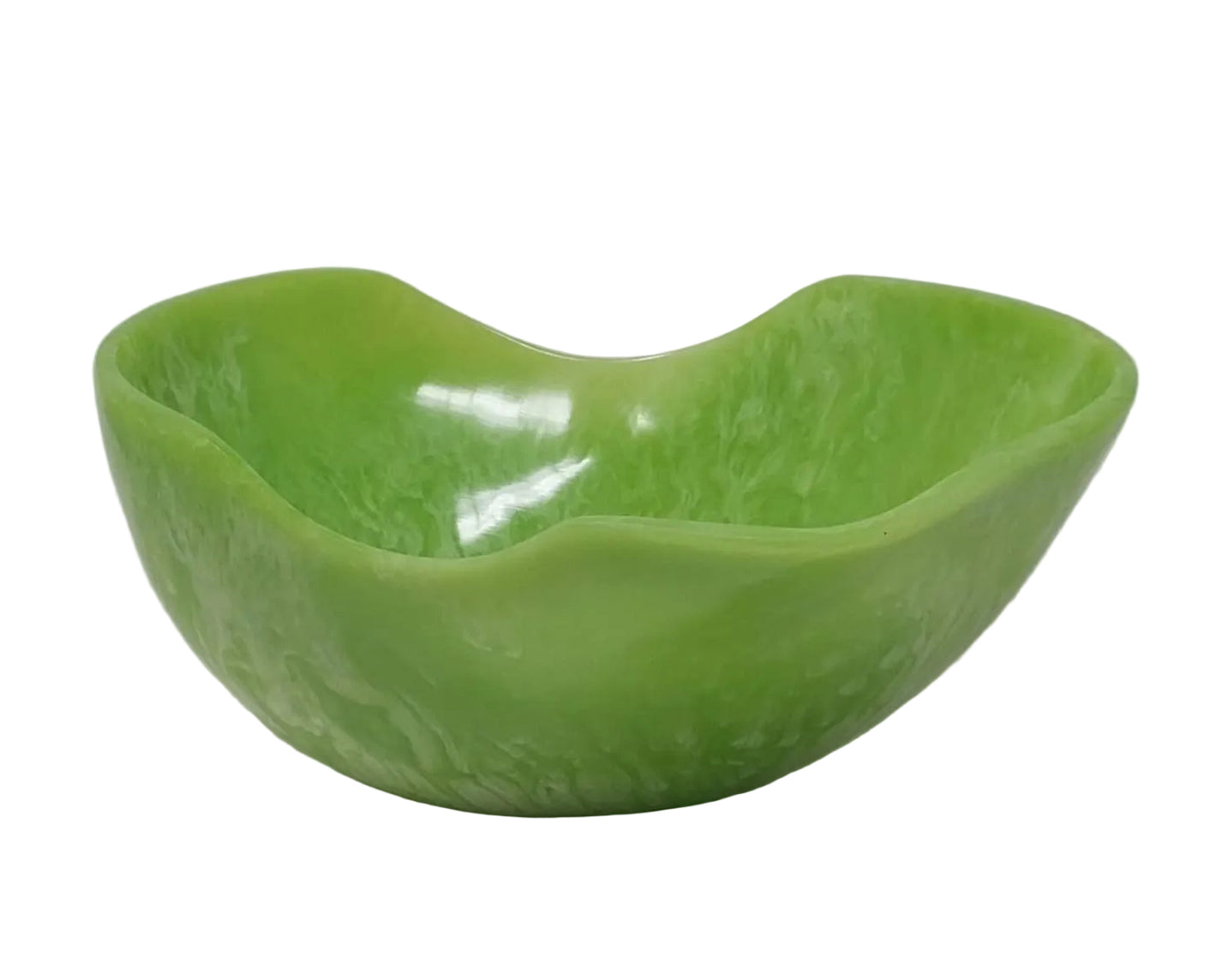 Green glass bowl on a light gray background