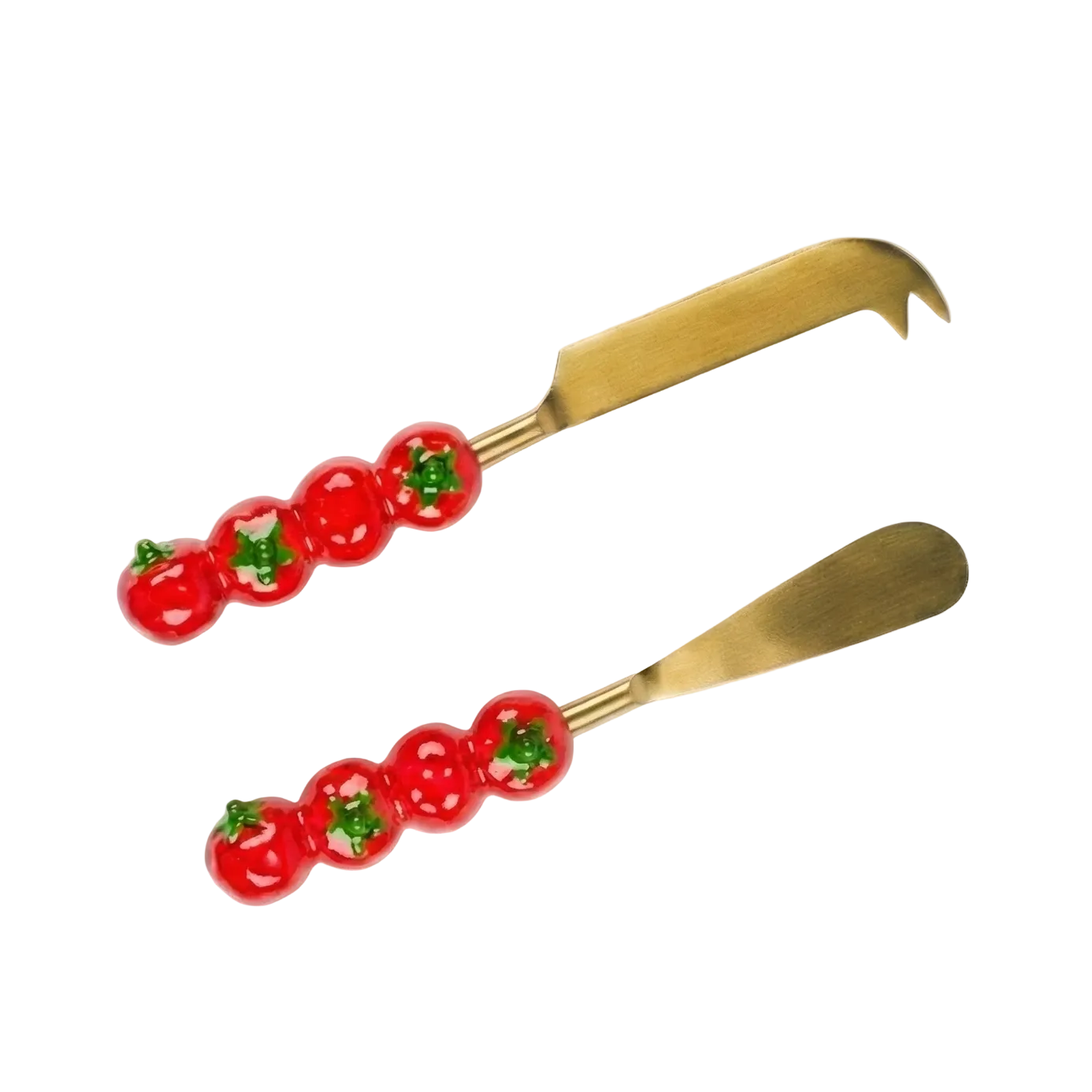 Two gold tools with red tomato-shaped handles on a white background