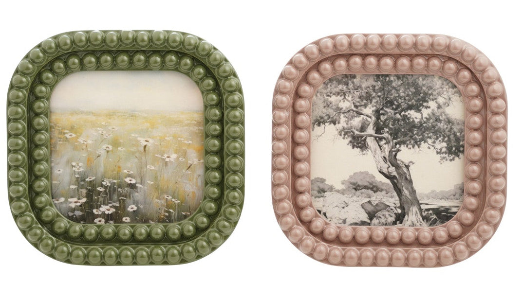 Two square decorative plates with beaded edges on a white background