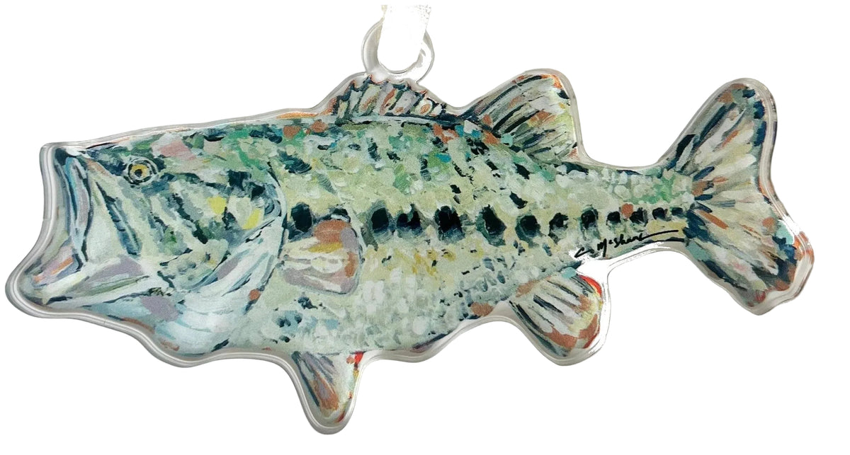 Decorative fish ornament with a ribbon on a white background