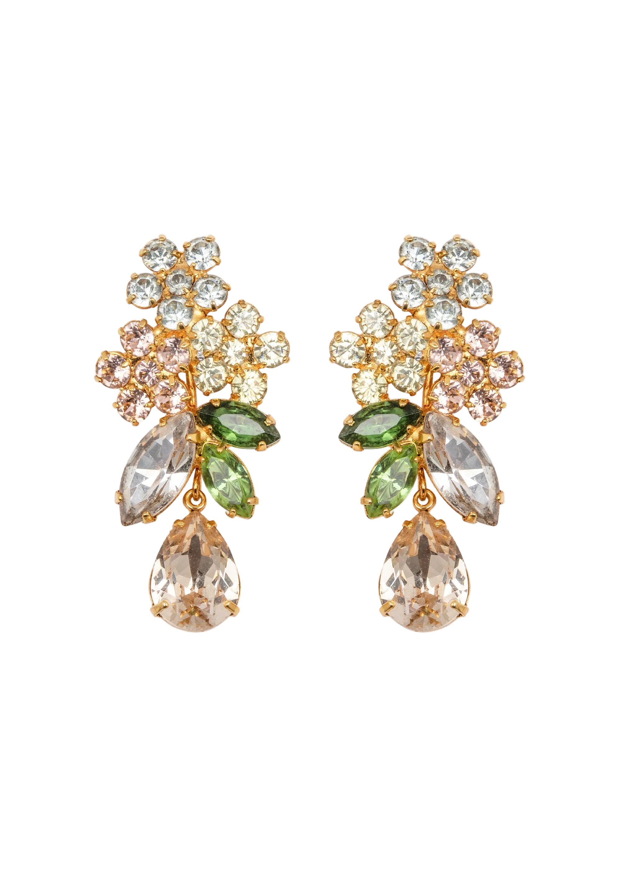 Pair of ornate earrings with gemstones on a white background