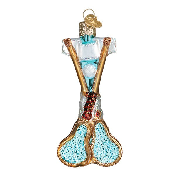 Glass ornament shaped like a lacrosse sticks with a lacrosse ball on a white background