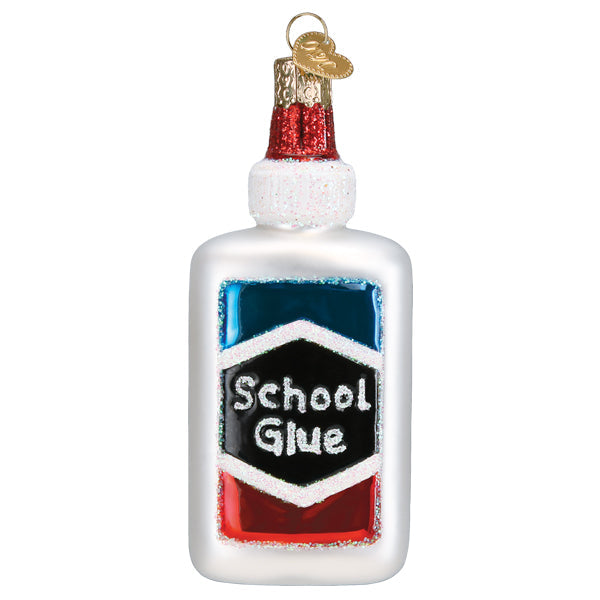 Glass ornament shaped like a bottle of school glue with a white cap on a white background
