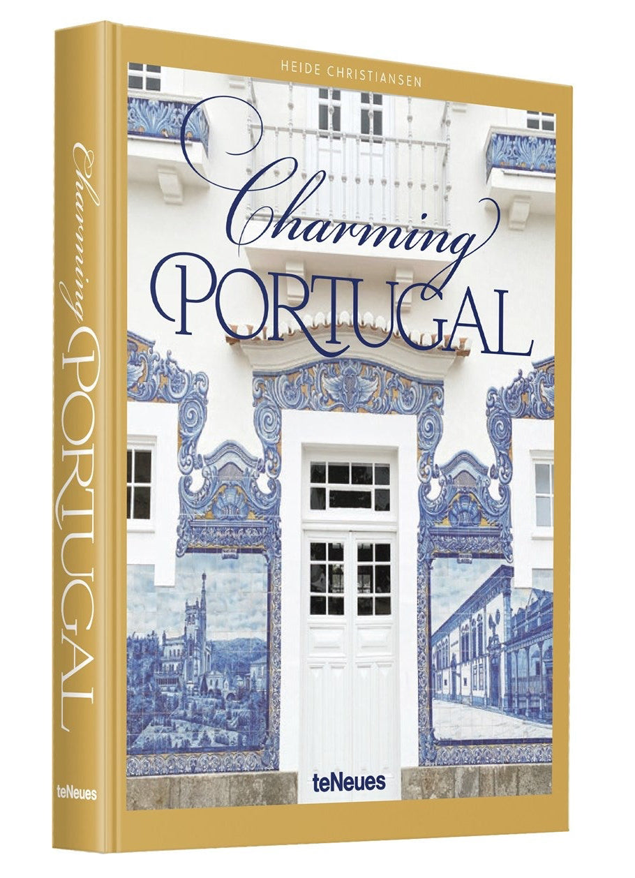 Book titled 'Charming Portugal' with a cover featuring a decorative door and windows.