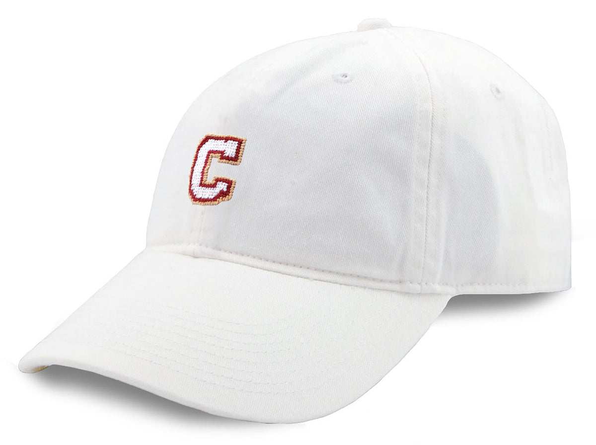 White cap with a red logo on a white background