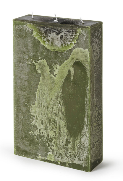 Green textured rectangular candle on a white background