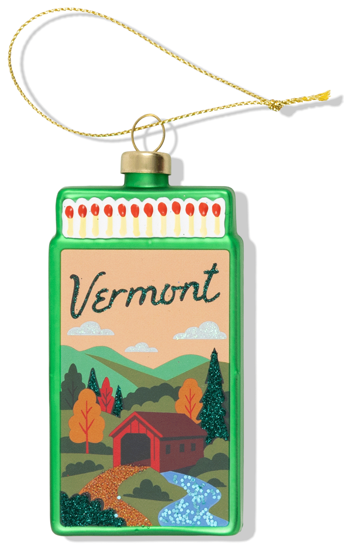 Decorative ornament shaped like a matchbox with a scenic design and 'Vermont' text on a white background.