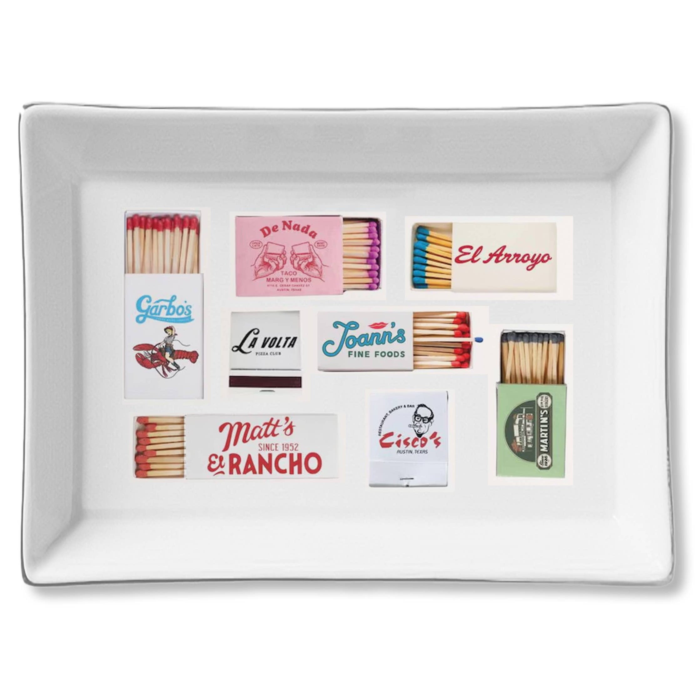 Rectangular white tray with matchbooks featuring various brand names on a white background