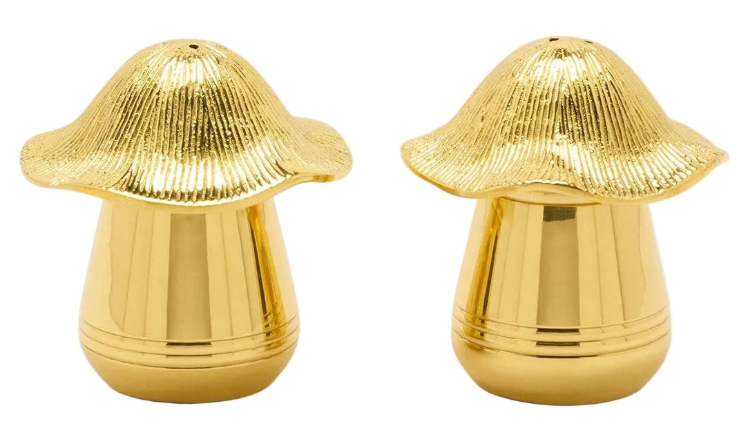 Two gold mushroom-shaped objects on a light gray background