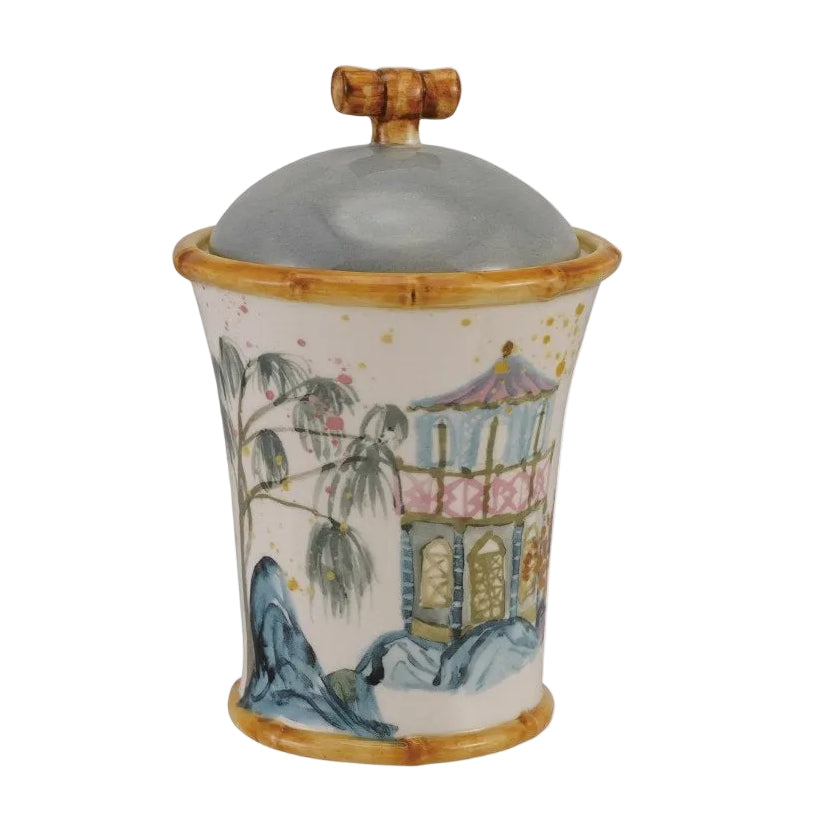 Decorative ceramic jar with lid on a white background