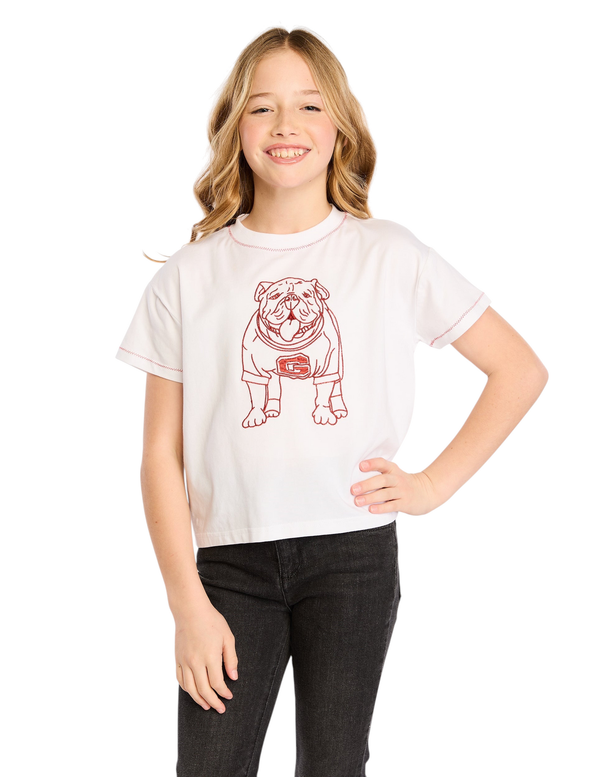 Young girl wearing a Miller Collective white cotton tee with a red embroidered bulldog graphic and contrast stitching.