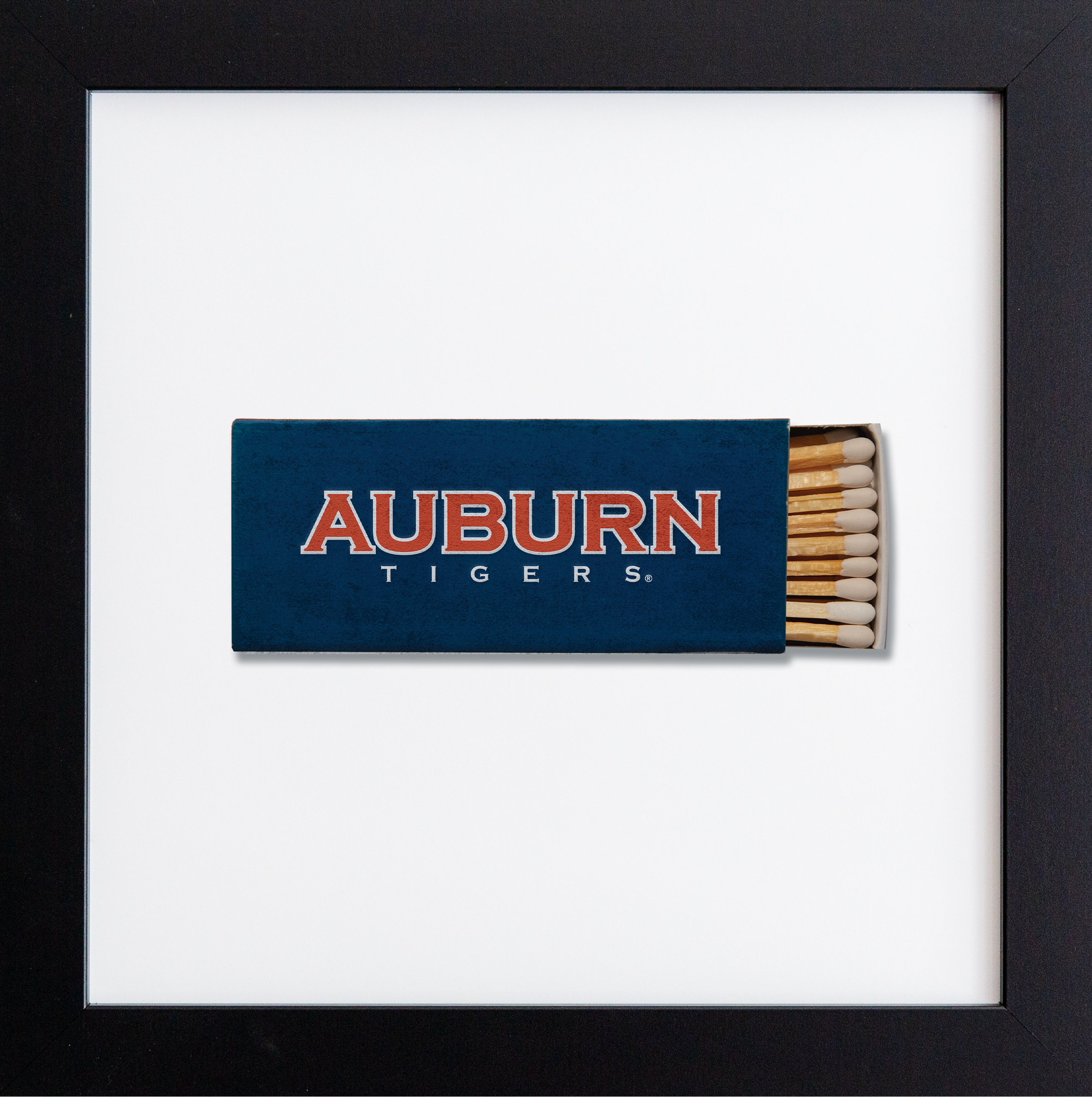 Framed matchbox with 'Auburn Tigers' branding on a white background