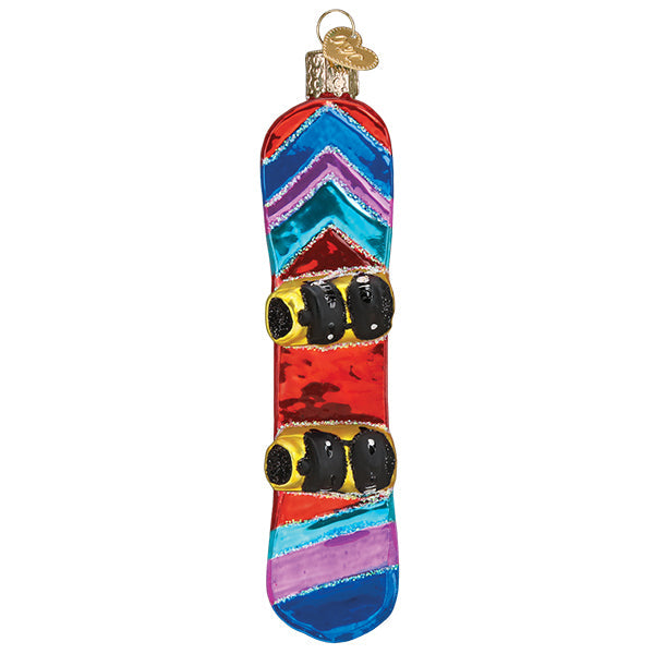 Colorful glass ornament shaped like a snowboard on a white background