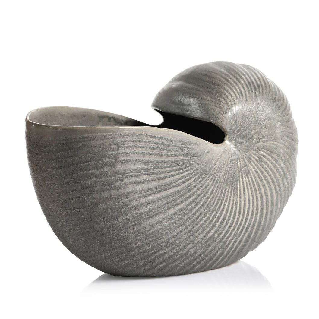 Gray ceramic shell-shaped bowl on a white background