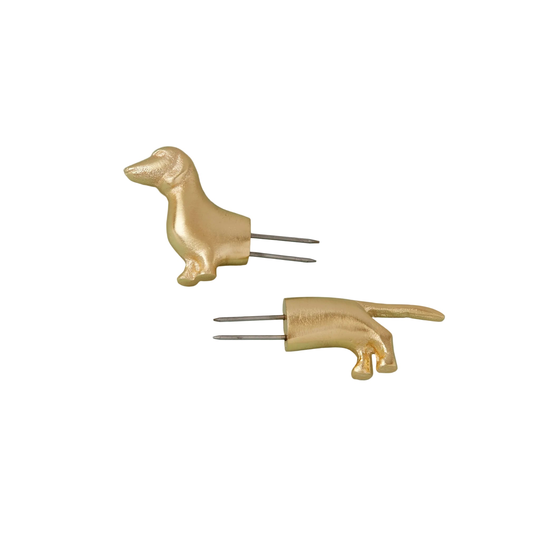 Gold dog-shaped hair clips on a light blue background