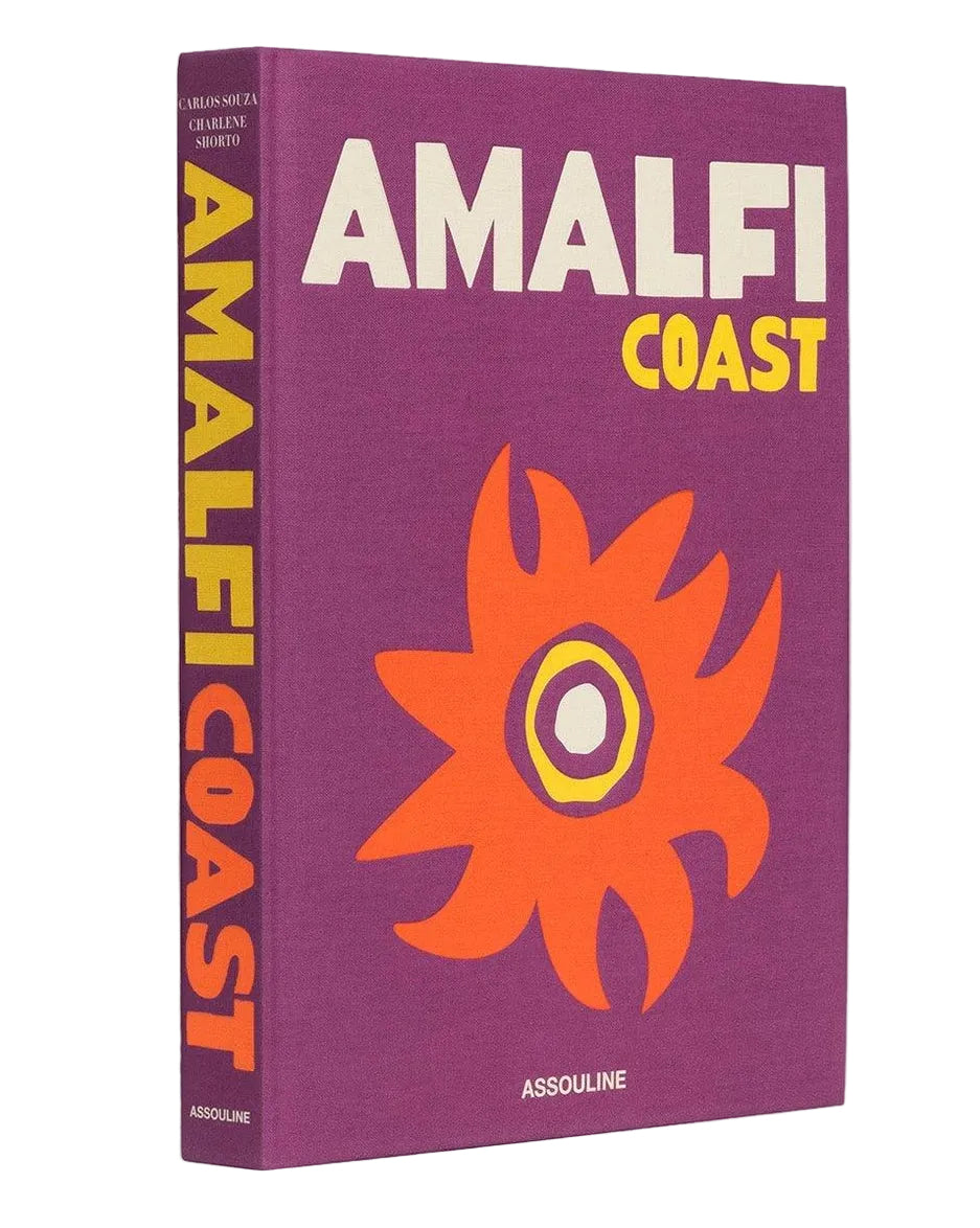 Book titled 'Amalfi Coast' with a purple cover and orange sun design on a white background