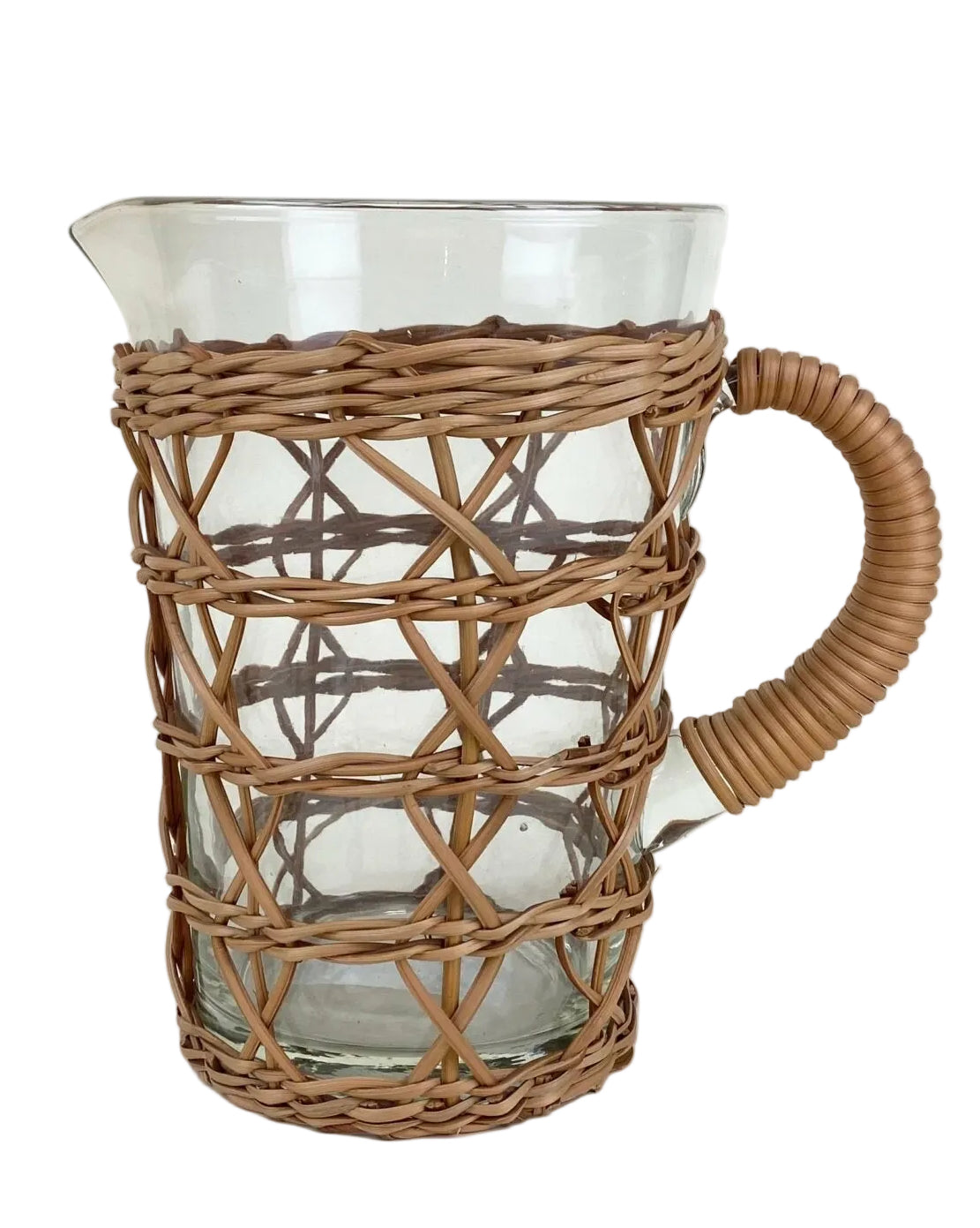 Clear glass pitcher with wicker handle and holder on a white background