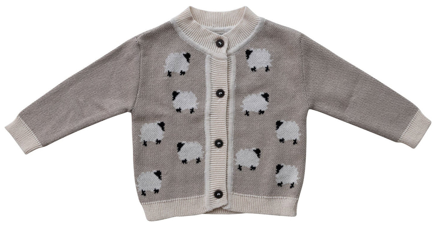 Children's cardigan with sheep pattern on a white background