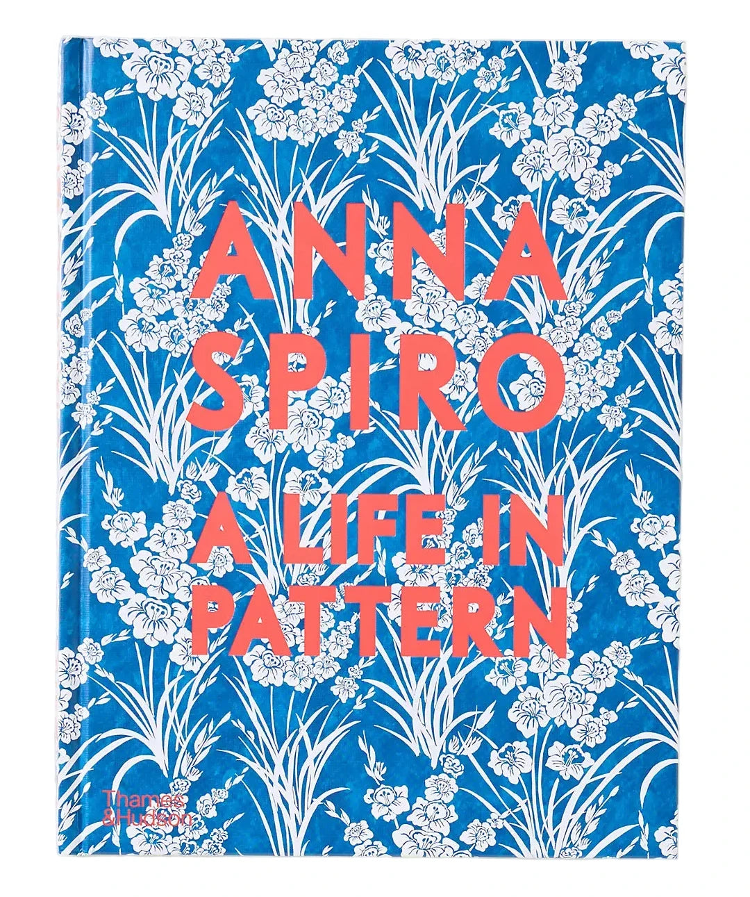 Book cover with floral design and text 'Anna Spiro: A Life in Pattern' on a blue background