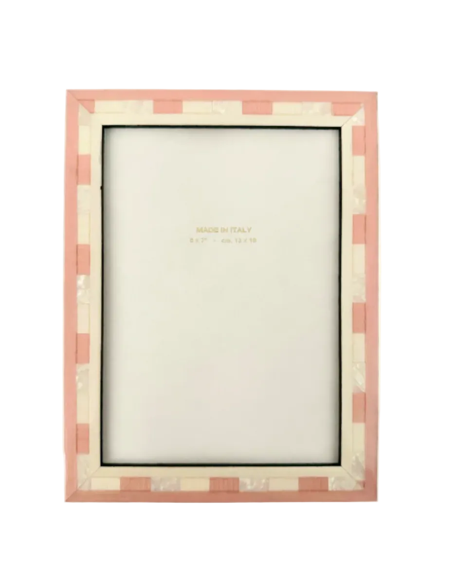Pink checkered picture frame on a white background