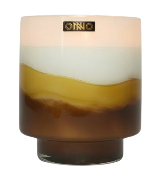 Cylindrical candle with a gradient design on a white background