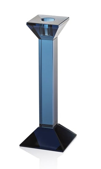 A modern geometric glass candlestick holder with a square top, a tall blue-tinted glass stem, and a square base, shown on a white background with a soft reflection.