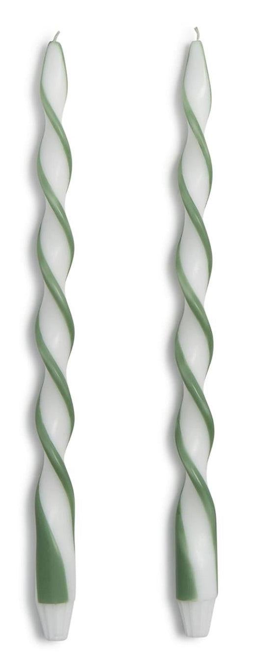 Two long spiral twist candles in white and sage green, standing vertically side-by-side on a plain white background.