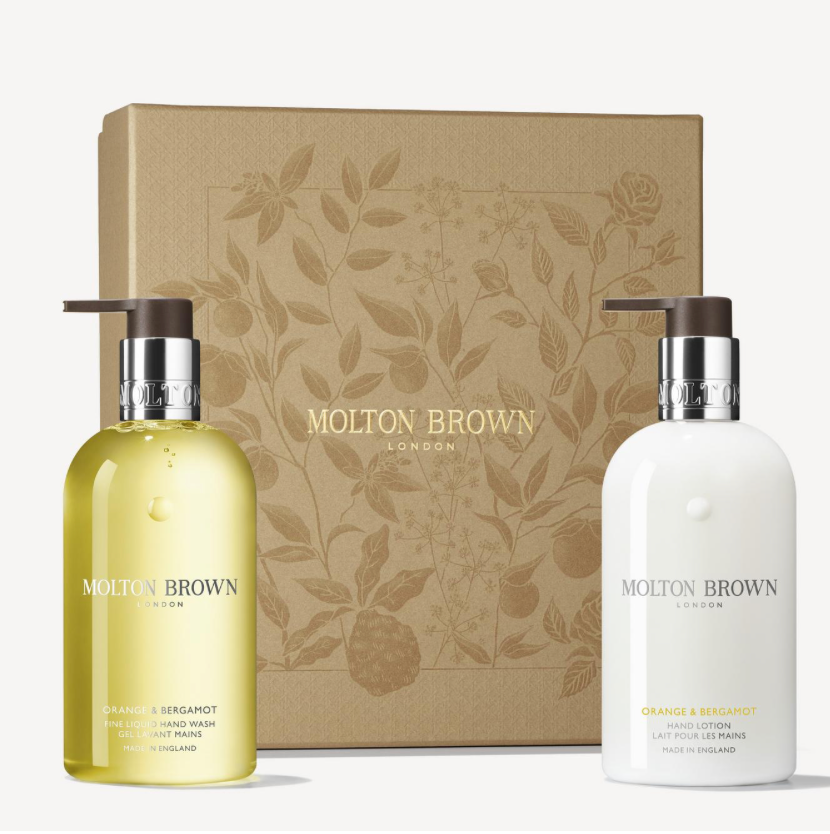 Molton Brown hand wash and lotion set with decorative box on a white background