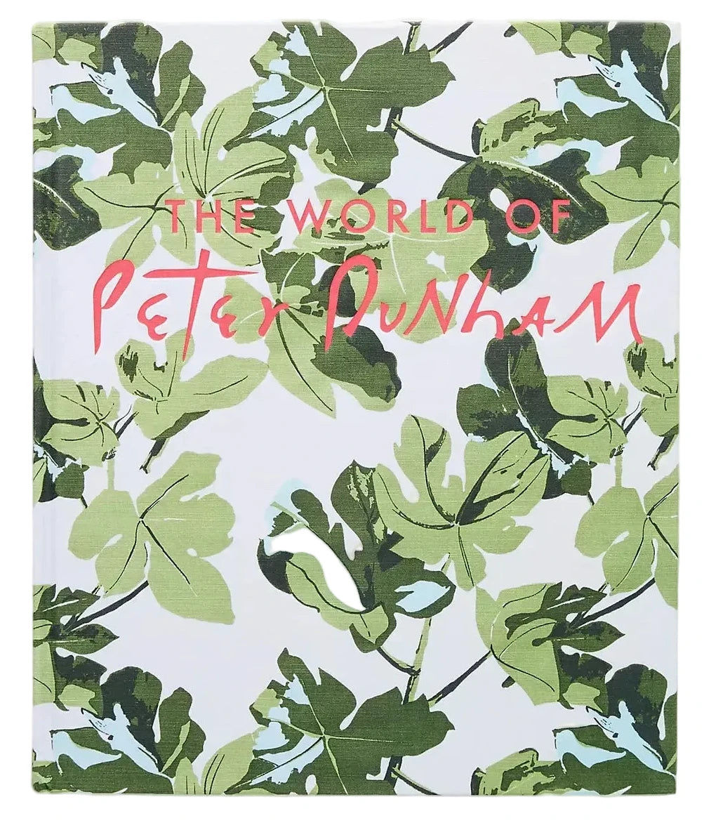 Book cover with green leaf pattern and 'The World of Peter Dunham' text