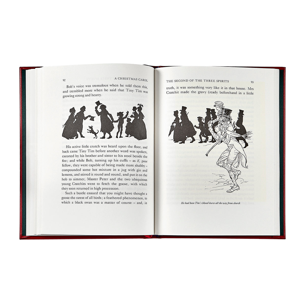 Open book with black and white illustrations and text on a white background