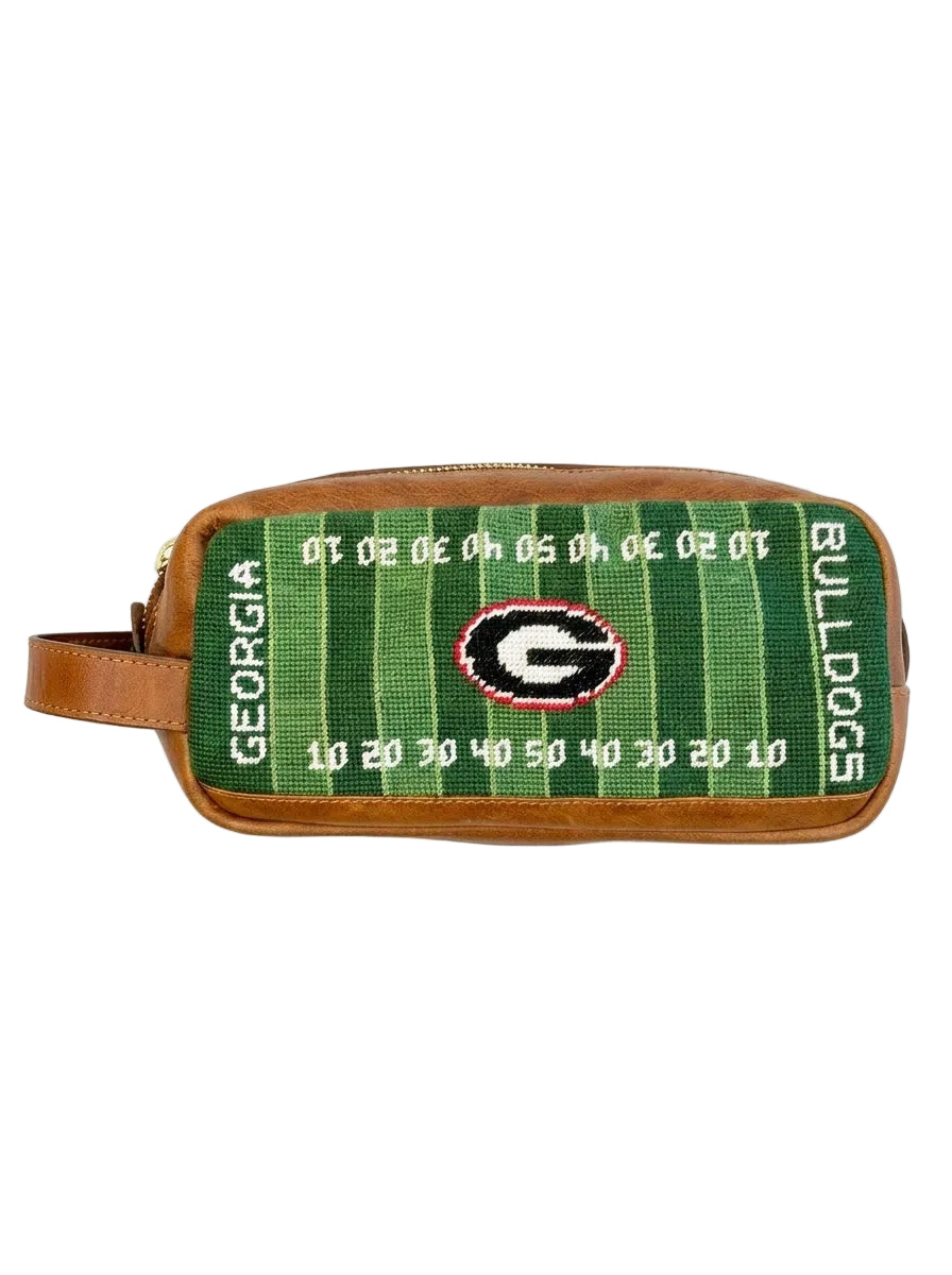 Green and brown toiletry bag with Georgia Bulldogs Stanford stadium on it on a white background