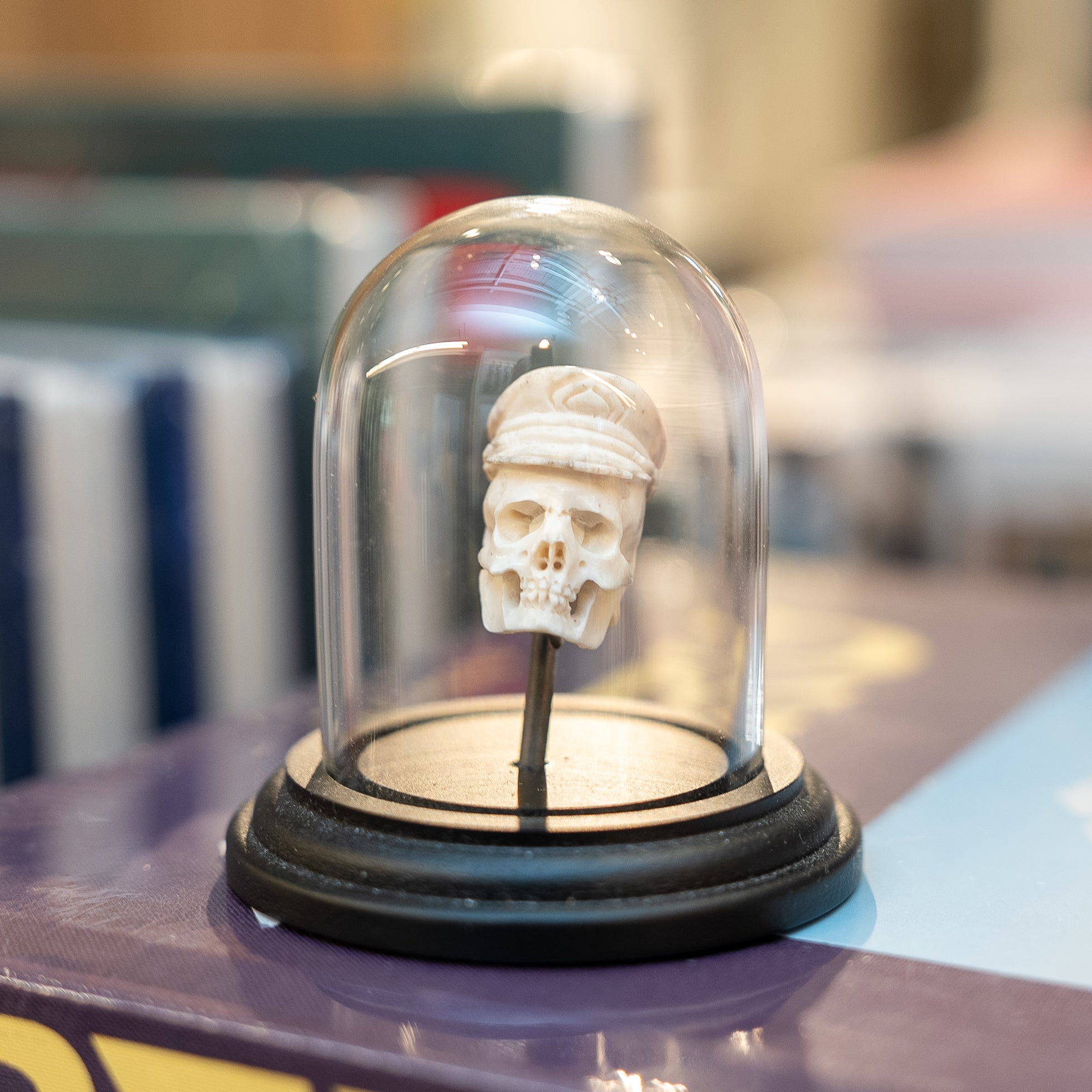 Bone Carved Skull with Hat in Cloche