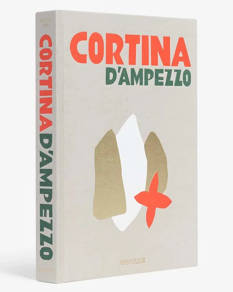 Book cover of 'Cortina d'Ampezzo' with red and green text on a beige background