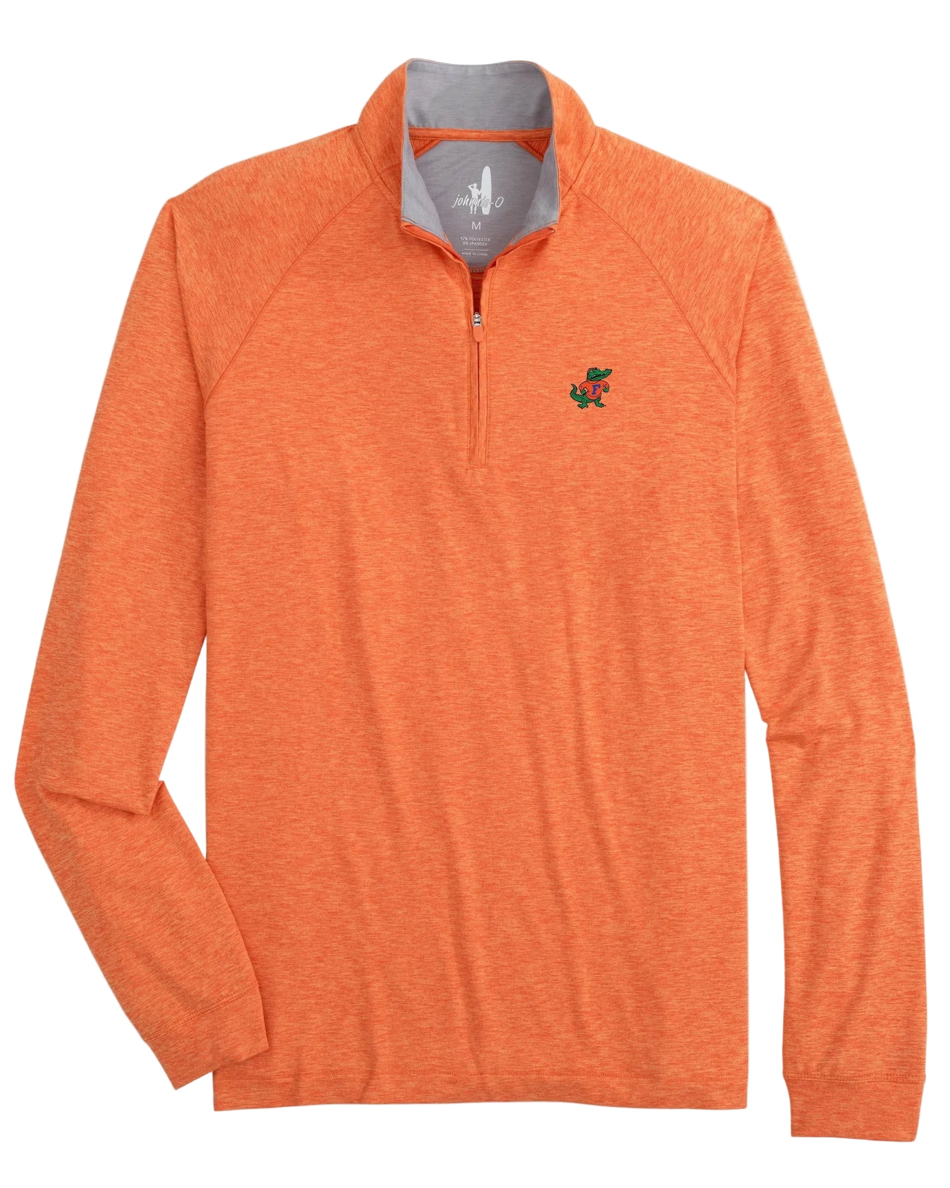 An orange 1/4 zip pullover with a visible logo on the chest, designed for performance with a peached finish and moisture wicking features.