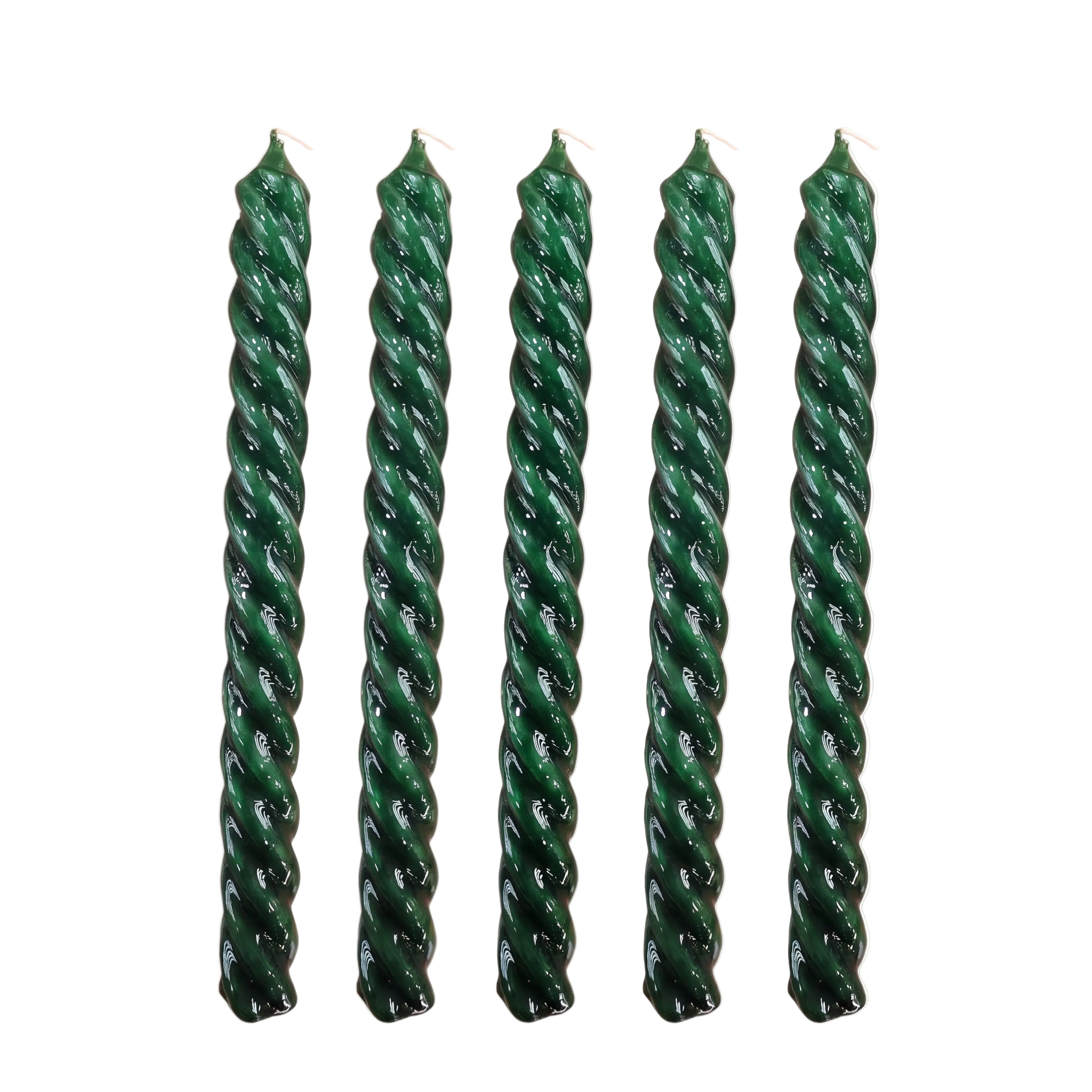 Five dark green twisted taper candles with a glossy finish, arranged vertically against a white background.