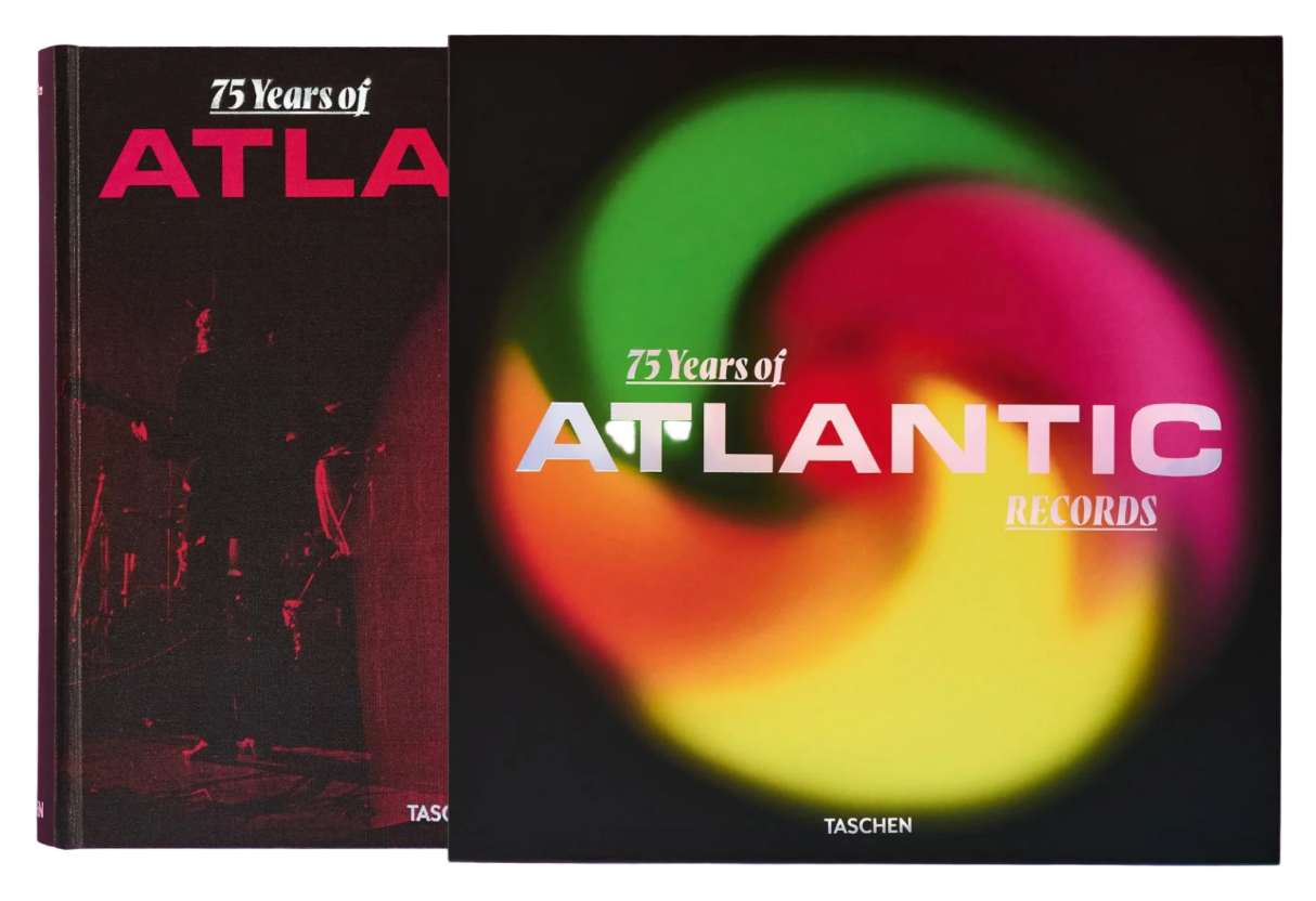 Two books celebrating 75 years of Atlantic Records, one with a red and black cover and the other with a colorful spiral design.