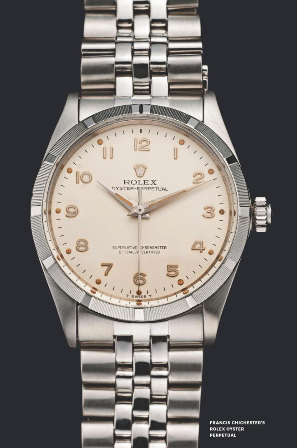 Rolex Oyster-Perpetual watch with a white face on a black background