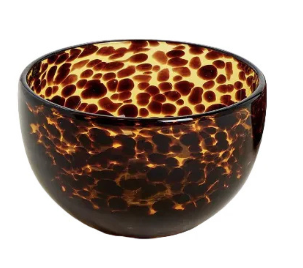 Tortoiseshell patterned glass bowl on a white background