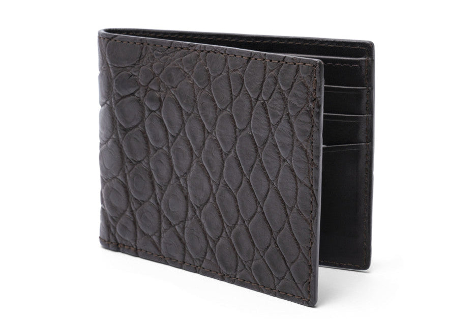 Black textured wallet on a white background