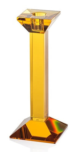 A single faceted acrylic letter 'I' candle holder in a translucent amber-yellow color, shown on a clean white background.