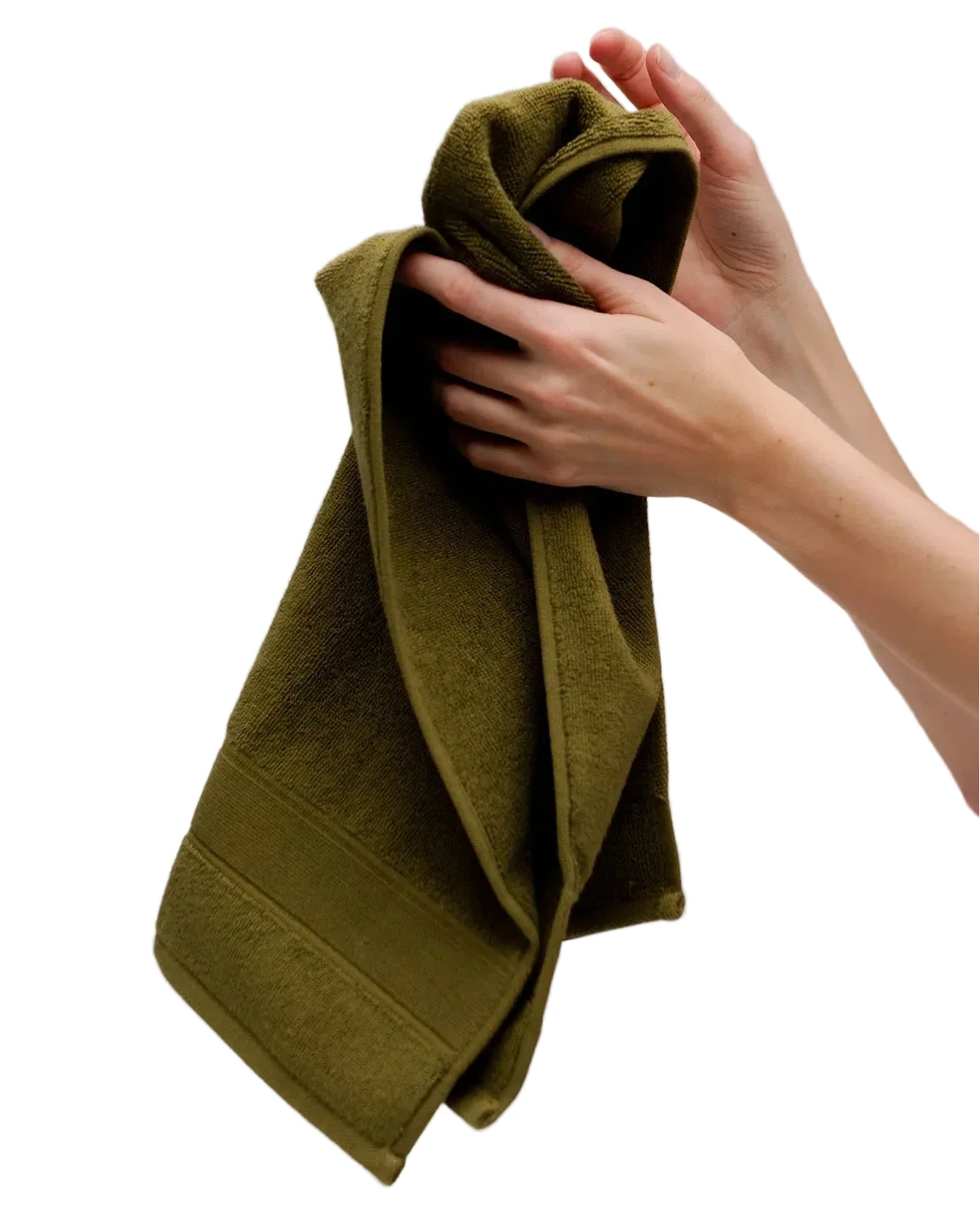 Person holding a green towel against a plain background