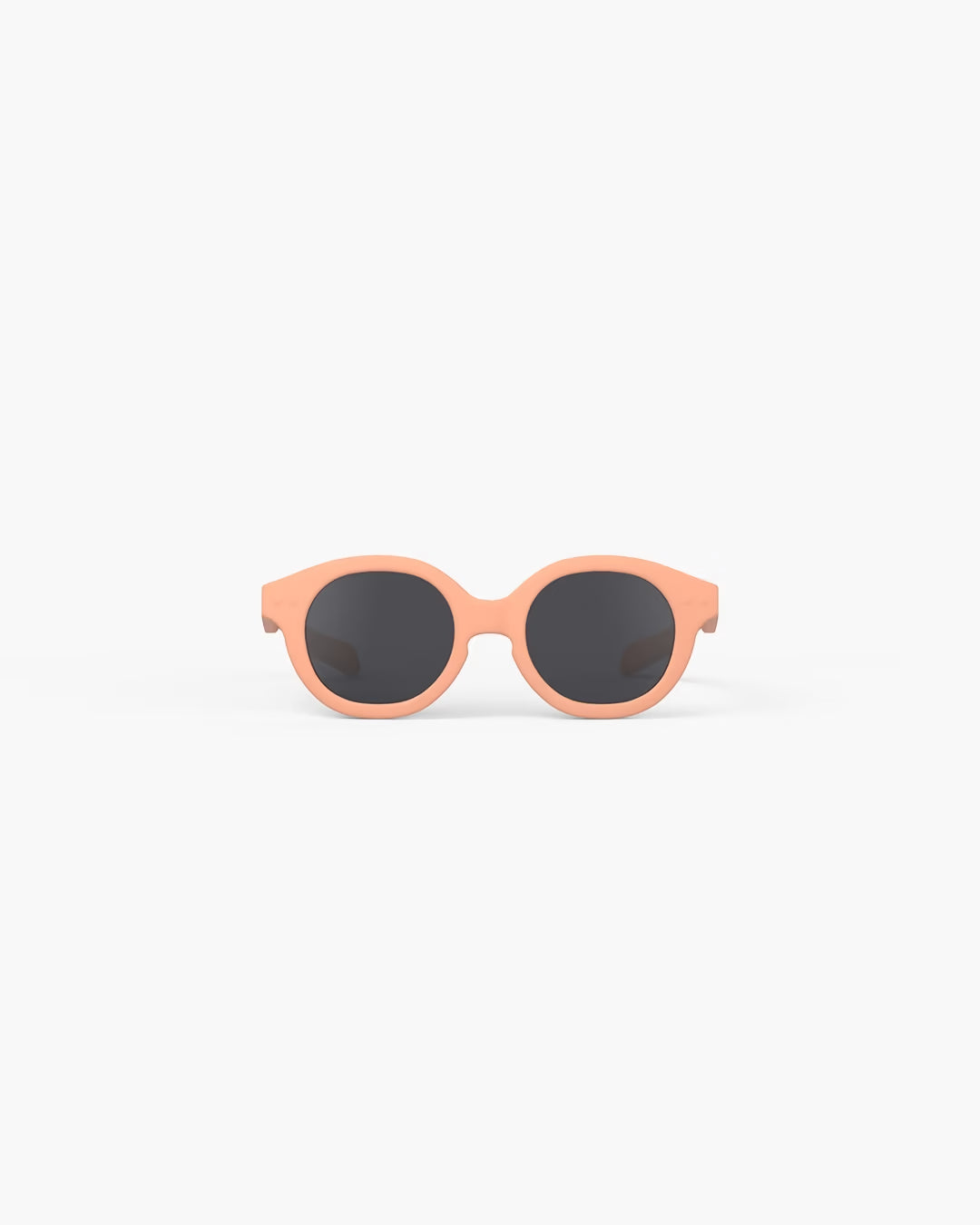 Pink sunglasses with black lenses on a white background