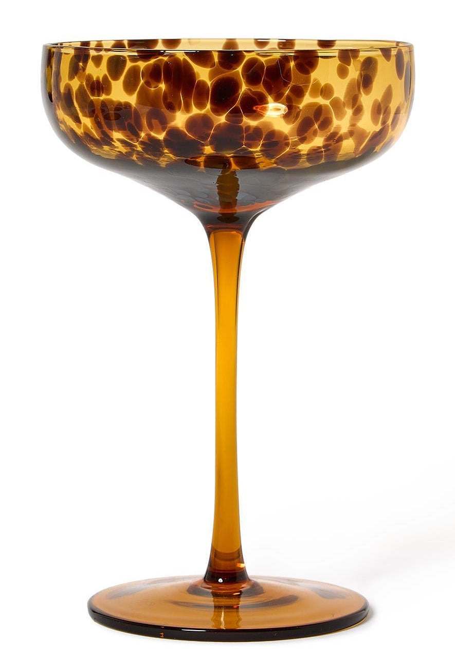 Cocktail glass with tortoiseshell pattern on a white background