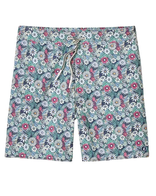 Floral patterned shorts on a light gray background