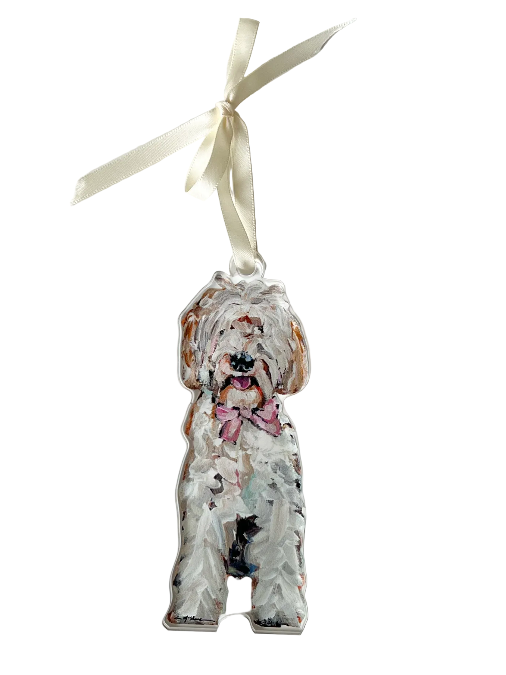Decorative dog ornament with a ribbon on a white background