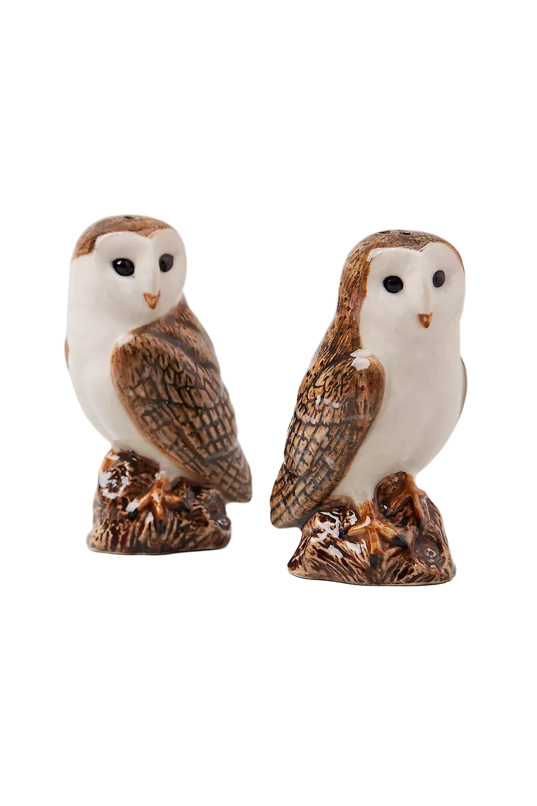 Two ceramic owl figurines on a white background