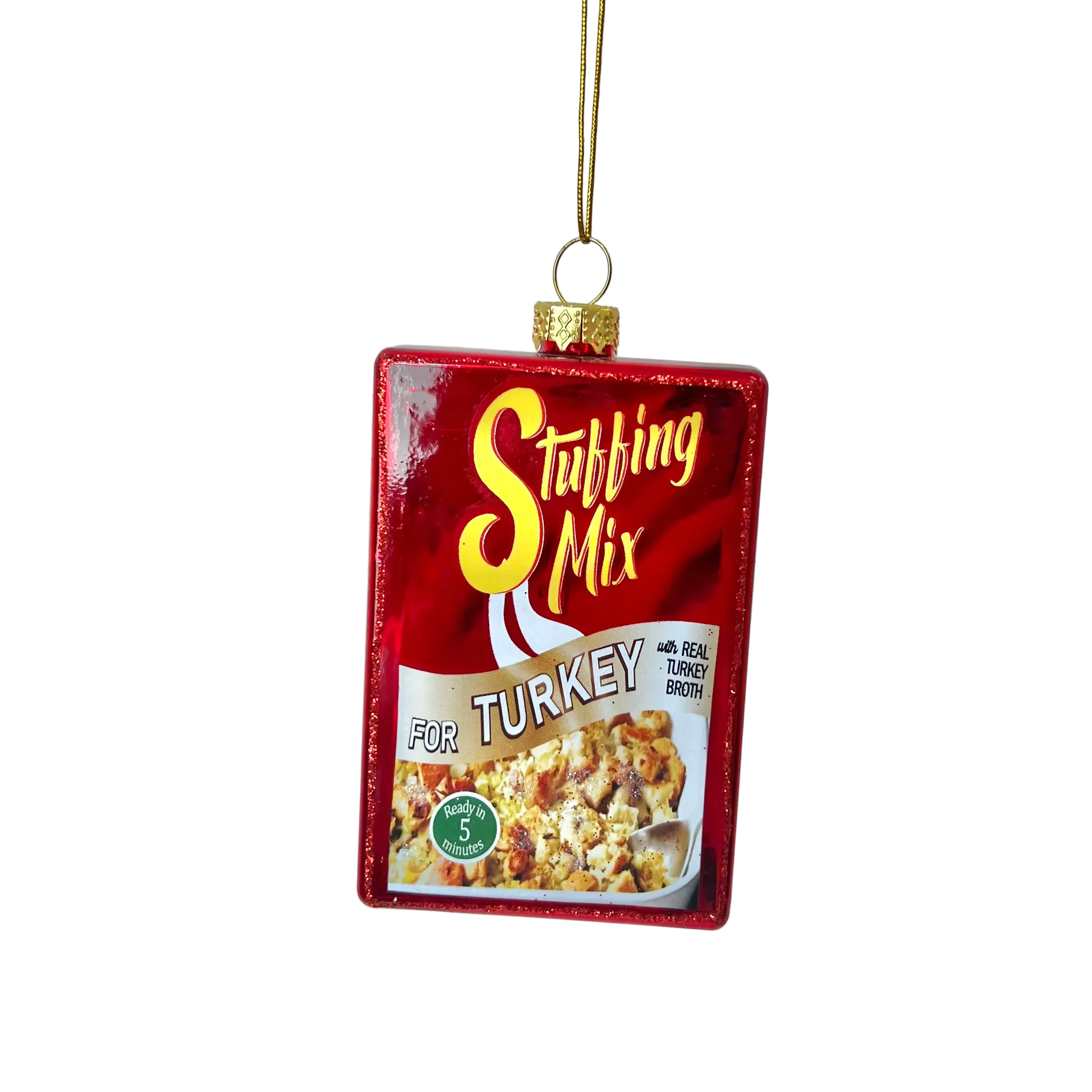 Decorative ornament shaped like a box of stuffing mix on a plain background